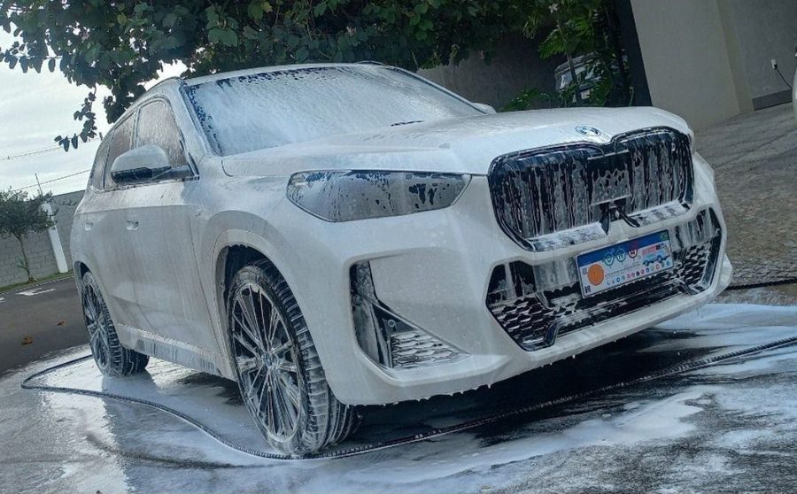 White SUV during the foam wash